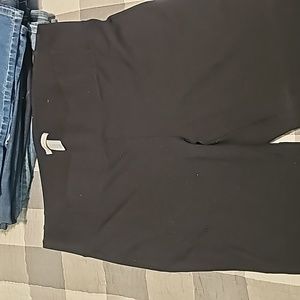 Black dress pant- skinny fit, rayon, nylon and spandex- very stretchy.